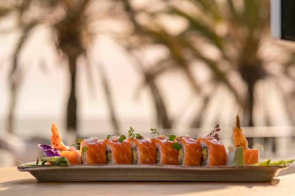 Salmon sushi rolls by the sea